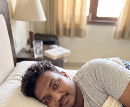 Person resting in bed after a fever